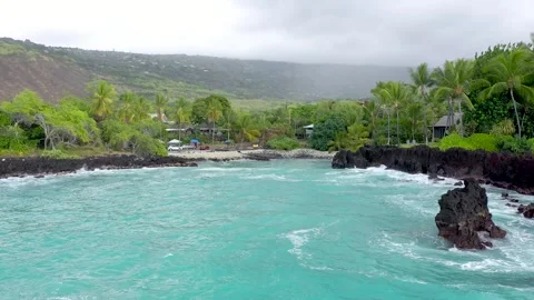 Cinematic Drone Flight Along Rugged Volcanic Beach and Turquoise Ocean, Big Stock Footage 328388024