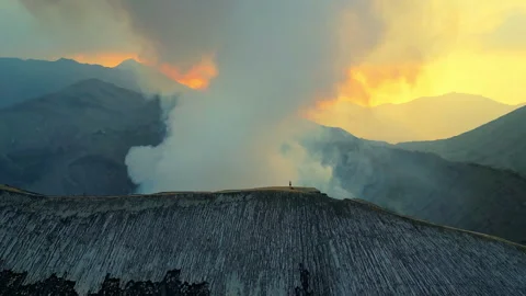 Cinematic Drone Flight Over Active Indonesian Volcano 4K UHD 動画素材 339298598
