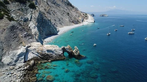 Cinematic drone flight over the beautiful Lalaria Beach in Skiathos, greece 스톡 동영상 104256359
