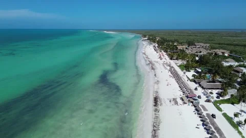 Cinematic drone flight over the blue waters and beach of Holbox, Mexico Stock Footage 331519847