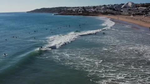 Cinematic drone flight over coastline in Luz. Stock Footage 168643620