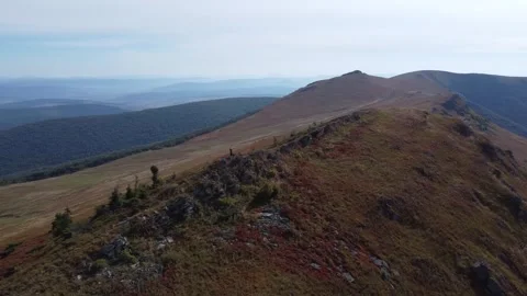 Cinematic drone flight over fall mountain highlands Stock Footage 338104798