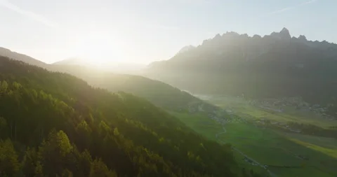 Cinematic drone flight over hill by sunset in autumn 5k Stock Footage 221844386