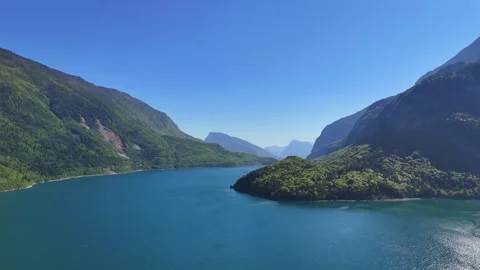 Cinematic Drone Flight Over Lago di Molveno and Mountain Valleys in the Vídeo Stock 337757413