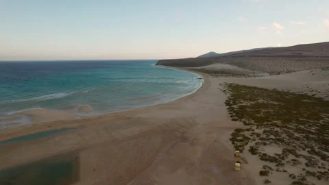 Cinematic Drone Flight Over Low Tide Playa de Sotavento at Sunset Stock Footage 309689657