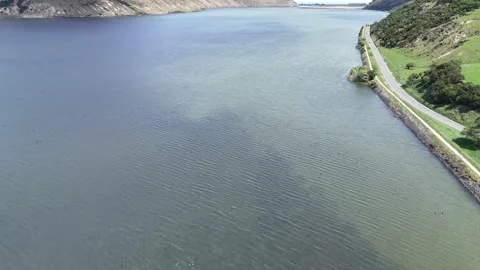 Cinematic Drone Flight Over the Remote Turquoise Waters of Peraki Vídeo Stock 314234096