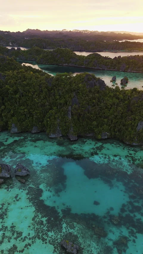 Cinematic Drone Flight Over Remote Misool Coastline 4K UHD 動画素材 336713367