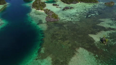 Cinematic Drone Flight Over Remote Misool Coastline 4K UHD 動画素材 337825352