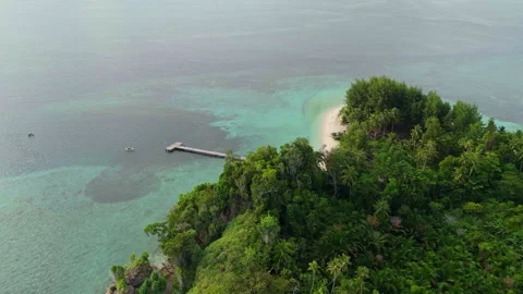 Cinematic Drone Flight Over Remote Panun Island Jetty Misool 4K UHD 動画素材 337830734