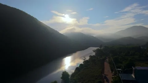 Cinematic Drone Flight Over River Valley at Sunrise Stock Footage 336857152