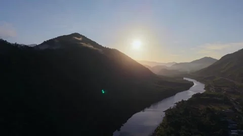 Cinematic Drone Flight Over River at Sunrise in Mountain Valley, Vietnam Video stock 336857249