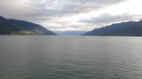 Cinematic Drone Flight Through Balanced Patagonian Fjord Between Mountains Video stock 333123397