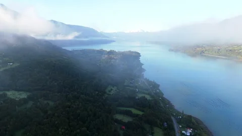 Cinematic Drone Flight Through Clouds Over Majestic Patagonian Fjord 库存影片 334320804