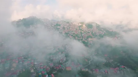 Cinematic Drone Flight Through Low Clouds Over Misty Shimla City Stockbeeldmateriaal 333062986