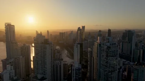 Cinematic Drone Flight Through Panama City Downtown Skyscrapers at Sunset Stock Footage 334339687