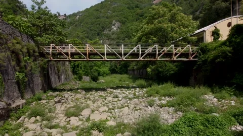 Cinematic Drone Flight Under Old Abandoned Bridge Stock Footage 248621579