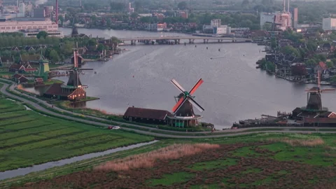 Cinematic Drone Fly-In to Spinning Windmill by Riverside Stock Footage 309312514