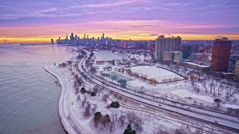 Cinematic drone flyover of Chicago’s Loop as the winter sun rises. Stock Footage 332131426
