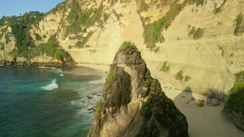Cinematic Drone Flyover Diamond Beach Pinnacle Cliffs Indonesia Video stock 339445848