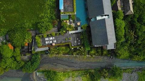 Cinematic drone footage of Berawa beach in Canggu, Bali with beautiful Stock Footage 201848592