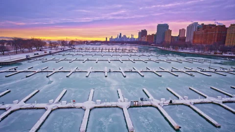 Cinematic drone footage of Chicago’s Loop awakening at winter dawn. Stock Footage 332131069