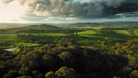 Cinematic Drone Footage of dramatic cloud scenery over New Zealands green Stock-Footage 330983233