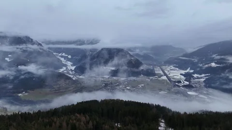 Cinematic Drone Forward Flight Over Alpine Pine Forest with Vipiteno Tow Stock Footage 331597688