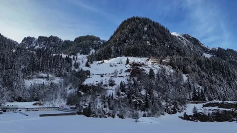 Cinematic Drone Forward Flight Over Snow-Covered Forest on a Sunny Winte Stock Footage 331941698