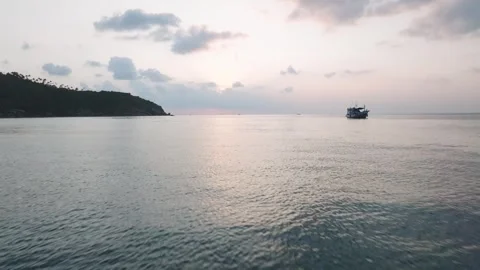 Cinematic Drone Introduction Shot  Sunset Reveal with Boat  Koh Phangan Stock Footage 333633137