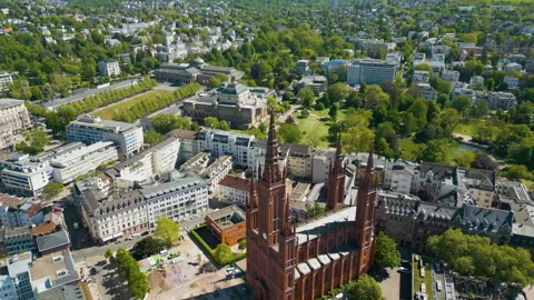 Cinematic Drone Orbit Marktkirche Wiesbaden with Kurhaus &amp; Theater Stock Footage 333980082