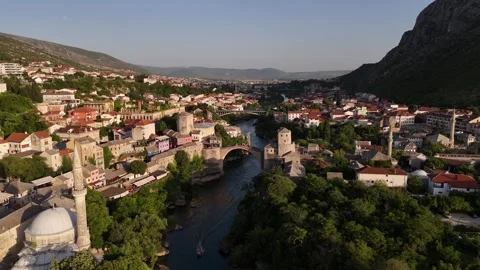 Cinematic Drone Orbit of Mostar Mosque and Stari Most Old Bridge 4K Stock Footage 337831155