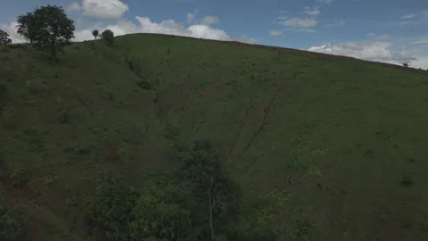 Cinematic Drone Over Bold Green and Brown Hillside Contrast With Endless Ro.. Stock-Footage 337600498
