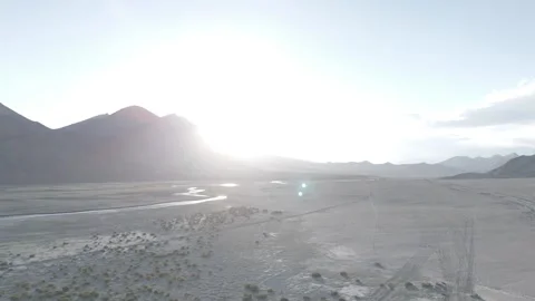 Cinematic Drone Pull Out of Vast Ladakh Landscape with River and Lens Flare Stock-Footage 334656785