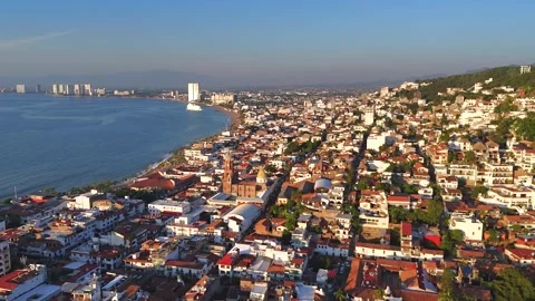 Cinematic Drone Pullback Over Hillside Revealing Puerto Vallarta Coast Video stock 333680917