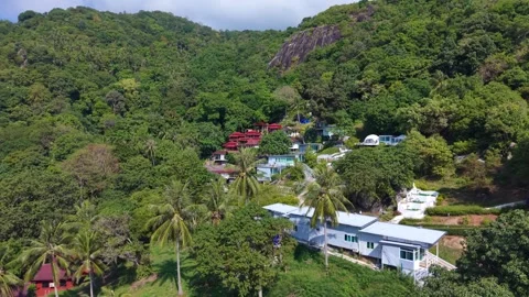 Cinematic Drone Pullback of Tropical Beach and Resort Villas Stock Footage 331085519