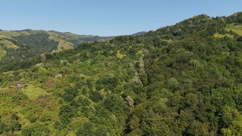 Cinematic drone push in over forest valleys Cherni Osam Bulgaria Stock-Footage 343915893