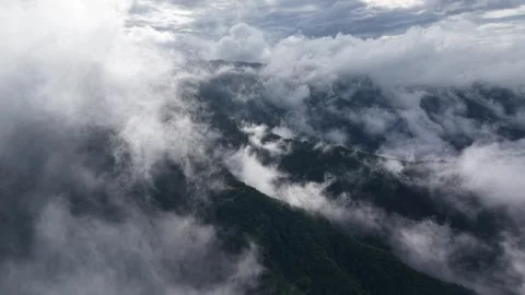 Cinematic Drone Shot: Ascending Forward Through Sea of Clouds in South Korea Stock Footage 345867489