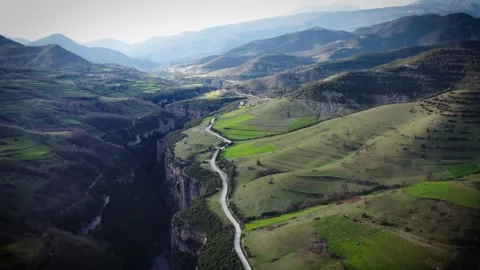 Cinematic drone shot moving left across Osumi Canyon in Albania Video stock 311055816