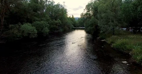 Cinematic drone shot of a river and its surroundings 4K Video stock 79280059