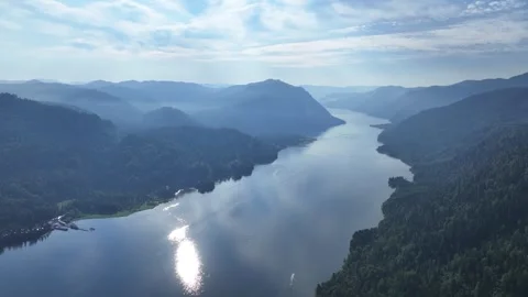 Cinematic Drone Shot Of A River With Its Forest Banks Stock Footage 259697921