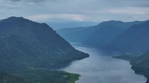 Cinematic Drone Shot Of A River With Its Forest Banks Stock Footage 259698552