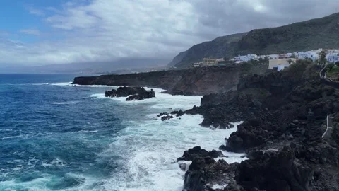 Cinematic Drone Shot of Waves Breaking on Tenerife Cliffs Видео 271362078