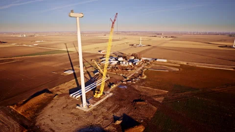 Cinematic drone shot of wind farm construction under way in Illinois Stock Footage 328387828
