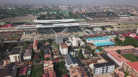 Cinematic Drone Shot of Yaba Train Station and Surrounding Area, Lagos, Nigeria Vídeos de archivo 328467911