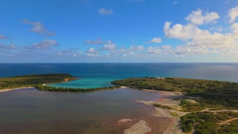 A cinematic drone sweep across a continuous chain of paradise beaches in Puerto 스톡 동영상 340831728