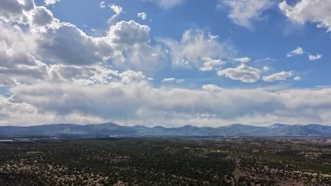 Cinematic Drone Timelapse of Clouds Bringing Shadows Over Desert Mesas Stock Footage 336569551