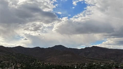 Cinematic Drone Timelapse of Ethereal Clouds Shifting over a Dramatic Southwest Видео 334155004