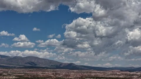 Cinematic Drone Timelapse of Rapidly Forming Clouds Over Desert Mesas Stock Footage 336526957