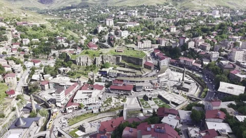 Cinematic Drone View of Bitlis City Center with Historic Stone Buildings and  Stock Footage 340233919
