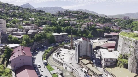 Cinematic Drone View of Bitlis City Center with Historic Stone Buildings and  Stock Footage 340238293